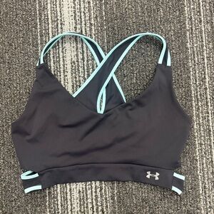 Under Armour Women's Black and Blue Sports Bra. Medium Cross back Cut Out